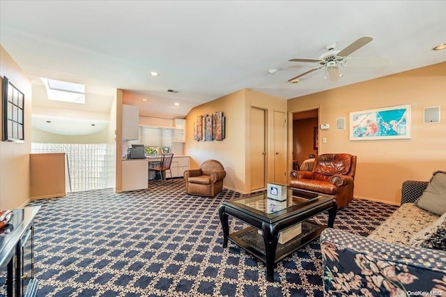 living room featuring carpet flooring and ceiling fan