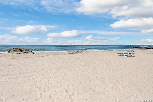 property view of water featuring a beach view