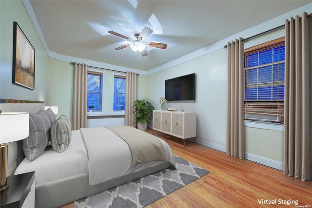77-12 35th Ave Unit A24, Jackson Heights, NY 11372 - bedroom featuring baseboards, wood finished floors, crown molding, and ceiling fan