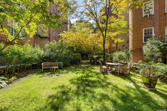 77-12 35th Ave Unit A24, Jackson Heights, NY 11372 - view of green lawn