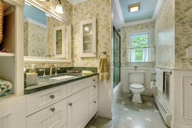 full bathroom featuring baseboard heating, combined bath / shower with glass door, crown molding, toilet, and vanity