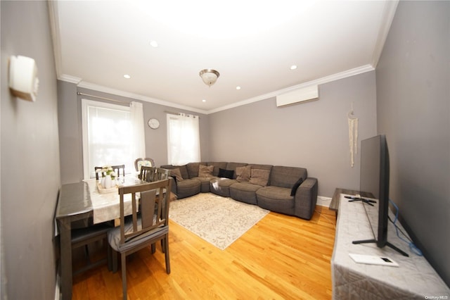 living room with hardwood / wood-style flooring and crown molding