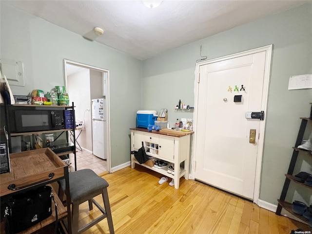 interior space with light hardwood / wood-style floors