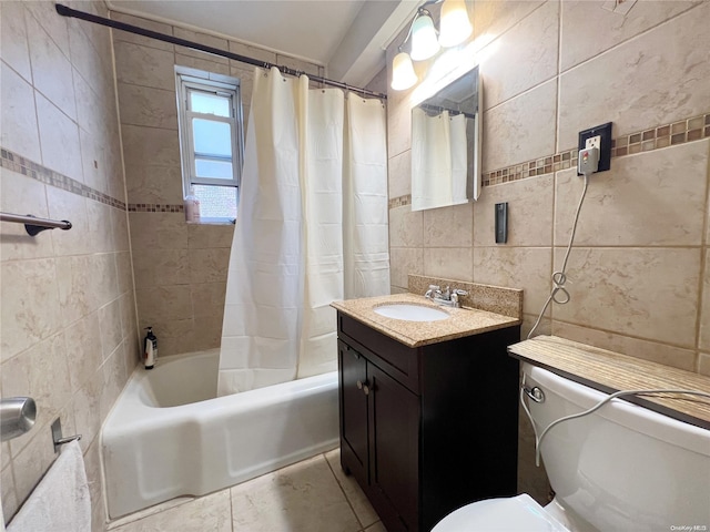 full bathroom with shower / bath combination with curtain, vanity, toilet, and tile walls