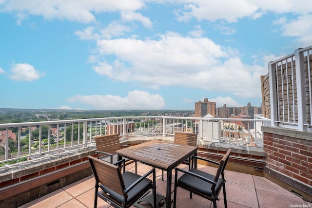 view of patio with a balcony