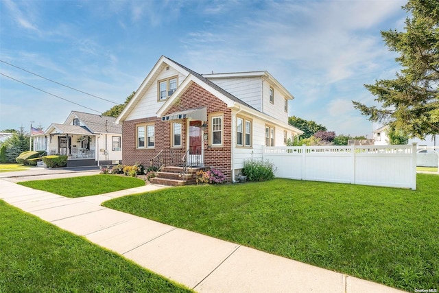 view of front of house with a front lawn