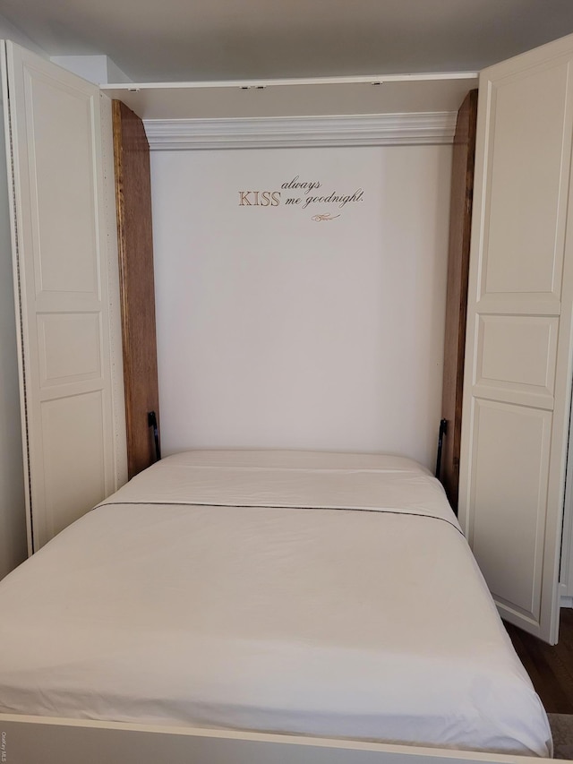 434 E 52nd St Unit 9A, New York Manhattan, NY 10022 - bedroom featuring dark wood-style flooring