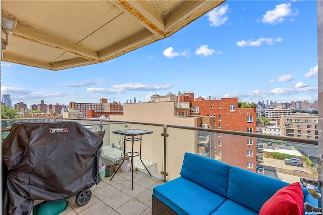 balcony featuring a grill and outdoor lounge area