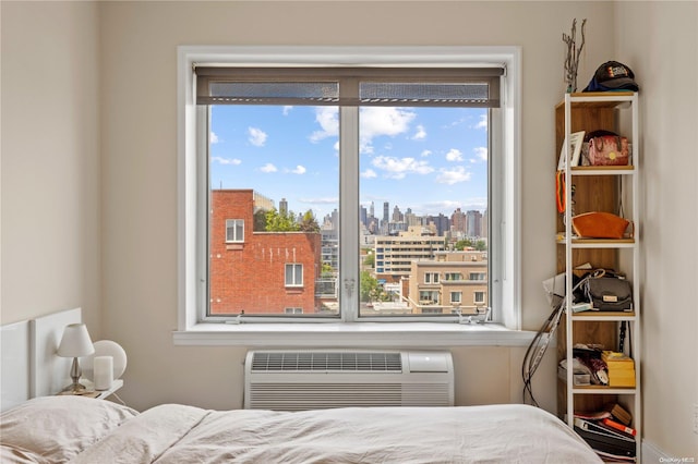 bedroom featuring a wall unit AC