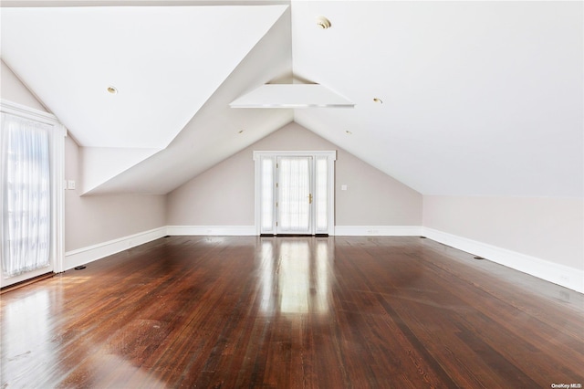 bonus room featuring hardwood / wood-style floors and lofted ceiling