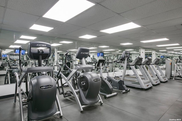 gym featuring a drop ceiling