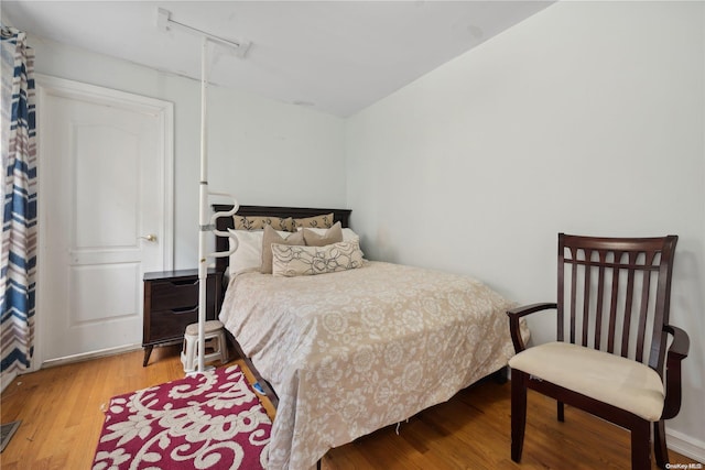 bedroom featuring light wood-type flooring