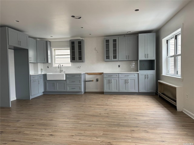 kitchen with gray cabinets and sink