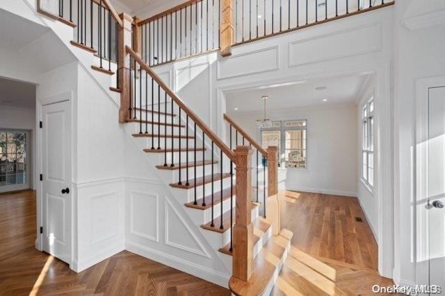 stairs with parquet floors