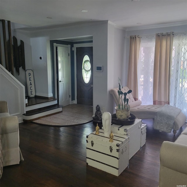 living room featuring crown molding and dark hardwood / wood-style floors