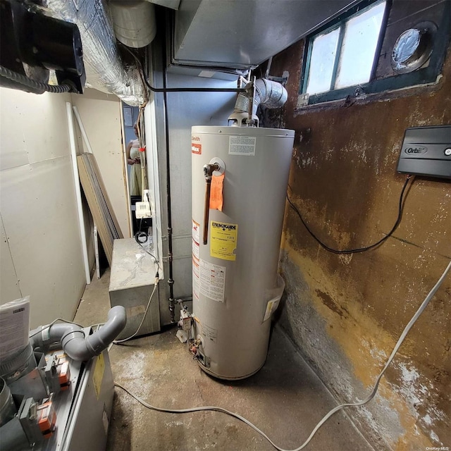 utility room with water heater