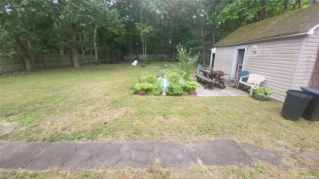 view of yard with a trampoline