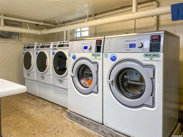 laundry room with independent washer and dryer