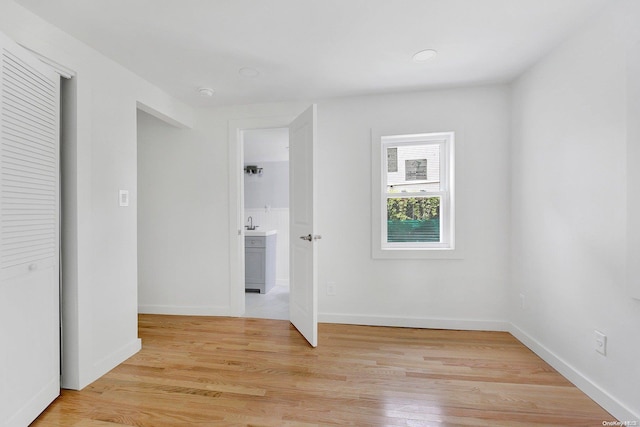 empty room with light wood-type flooring