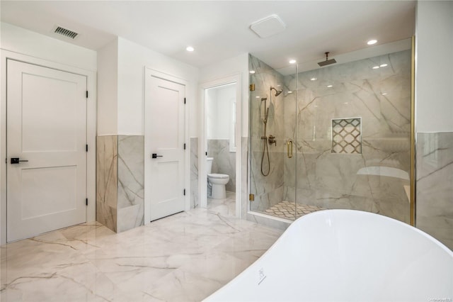 bathroom featuring toilet, tile walls, and independent shower and bath