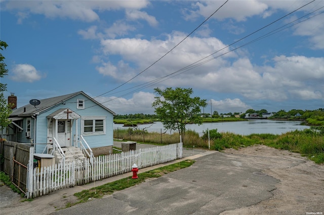 exterior space with a water view