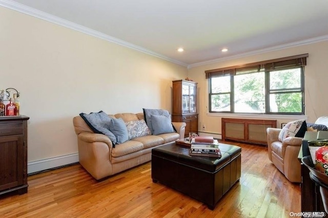 living room with ornamental molding, light hardwood / wood-style flooring, and a baseboard heating unit