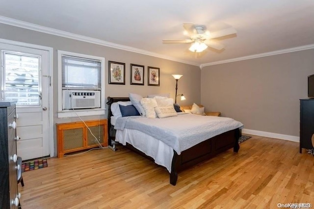 bedroom with ceiling fan, crown molding, cooling unit, and light wood-type flooring