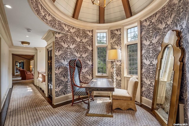 living area with beam ceiling, a towering ceiling, a chandelier, and dark colored carpet