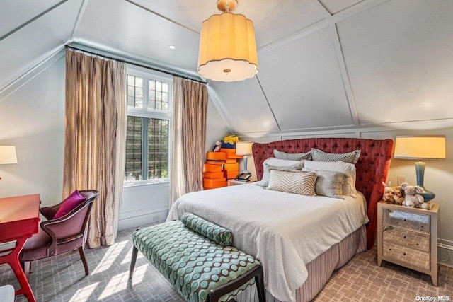 bedroom featuring carpet flooring and vaulted ceiling