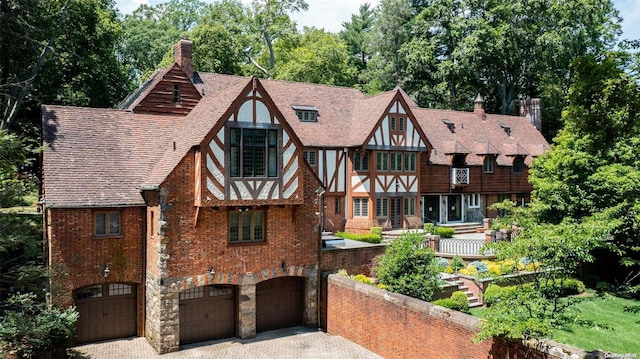 tudor home with a garage