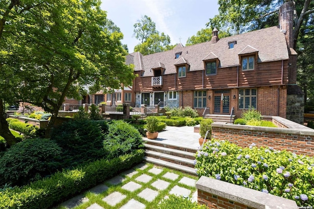 rear view of property with a patio area