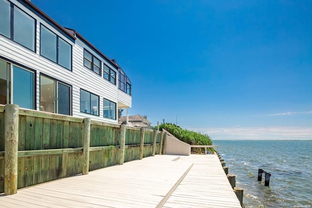 dock area featuring a water view