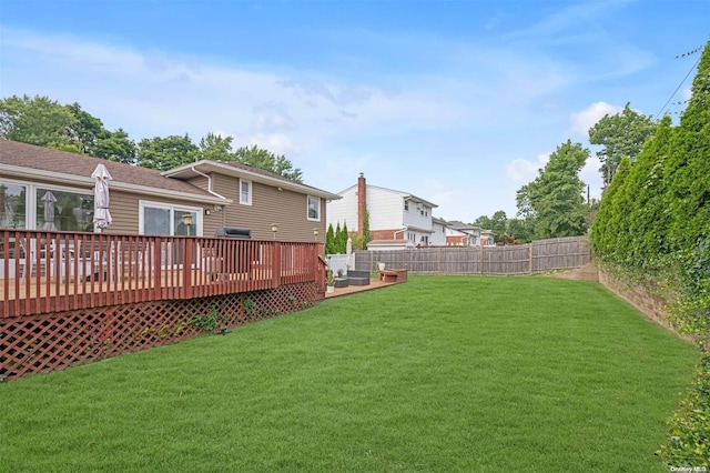 view of yard with a deck