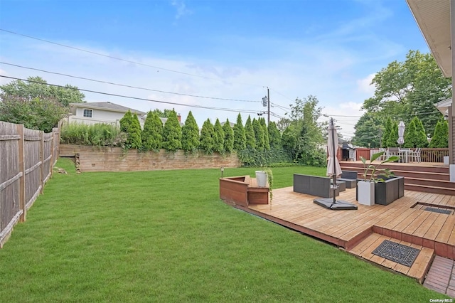 view of yard with a wooden deck