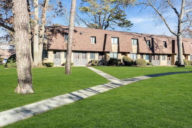 exterior space featuring a lawn