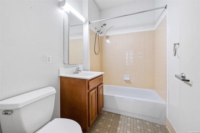 full bathroom with vanity, toilet, and tiled shower / bath combo