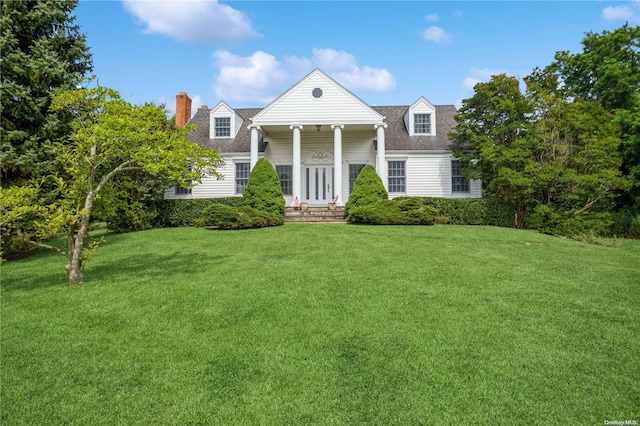 view of front of property with a front lawn