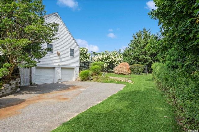 view of yard with a garage