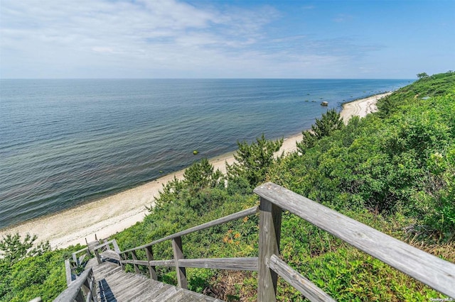 view of water feature with a beach view