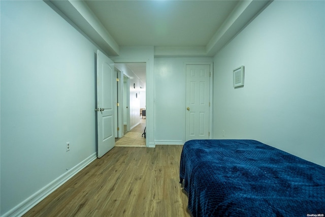 bedroom with light hardwood / wood-style floors