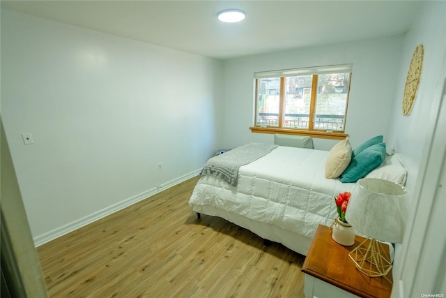 bedroom featuring light hardwood / wood-style flooring