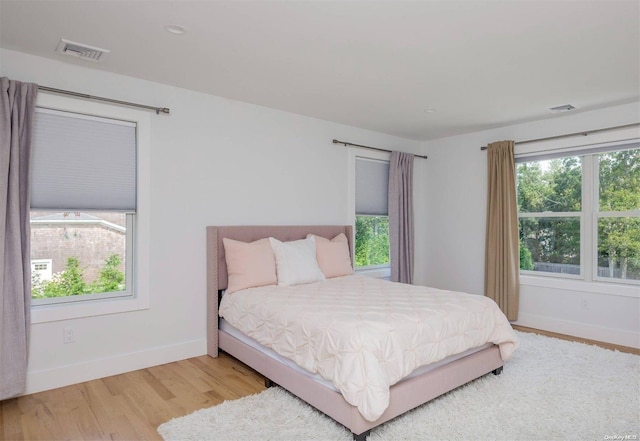 bedroom featuring light hardwood / wood-style flooring