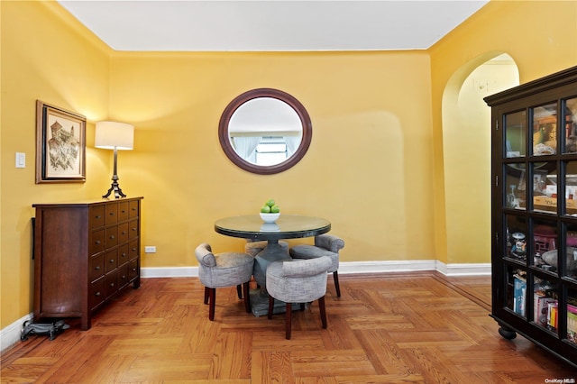 dining room featuring light parquet flooring