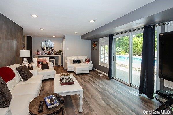 living room with wood-type flooring