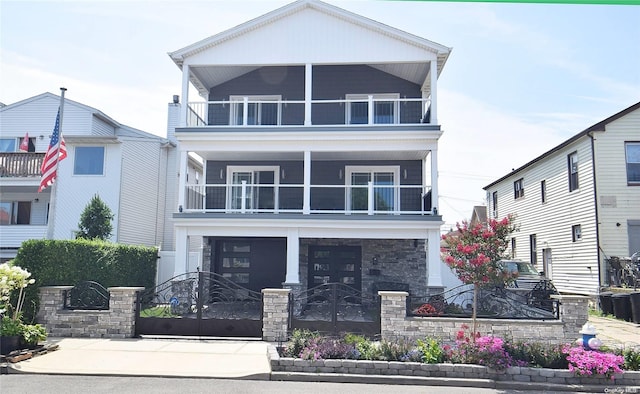 view of front of property with a balcony