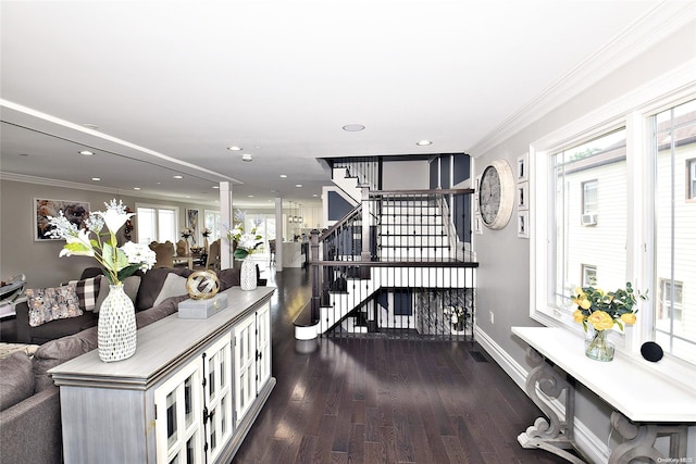 interior space with crown molding and hardwood / wood-style flooring