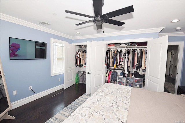 bedroom featuring ceiling fan, crown molding, and dark hardwood / wood-style floors