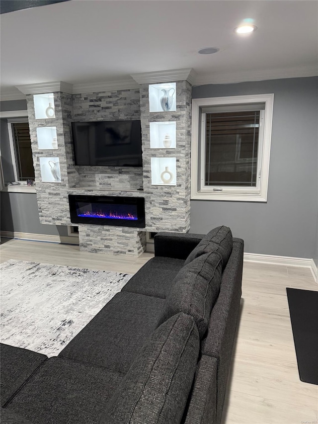 living room featuring a fireplace and hardwood / wood-style flooring