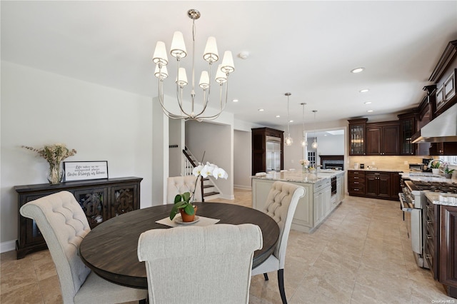 dining area featuring a chandelier