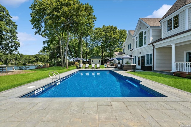 view of pool featuring a gazebo, a patio, and a lawn